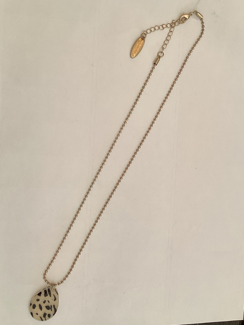 Plunder Gold-Tone Chain Necklace with Cream and Black Speckled Teardrop